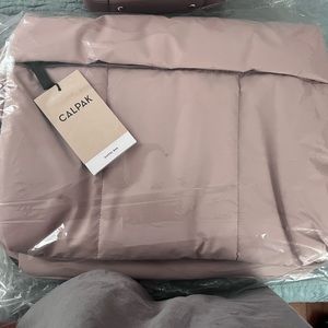 Calpak Luka Duffel Bag in Rose Quartz. Regular Size not the Large.